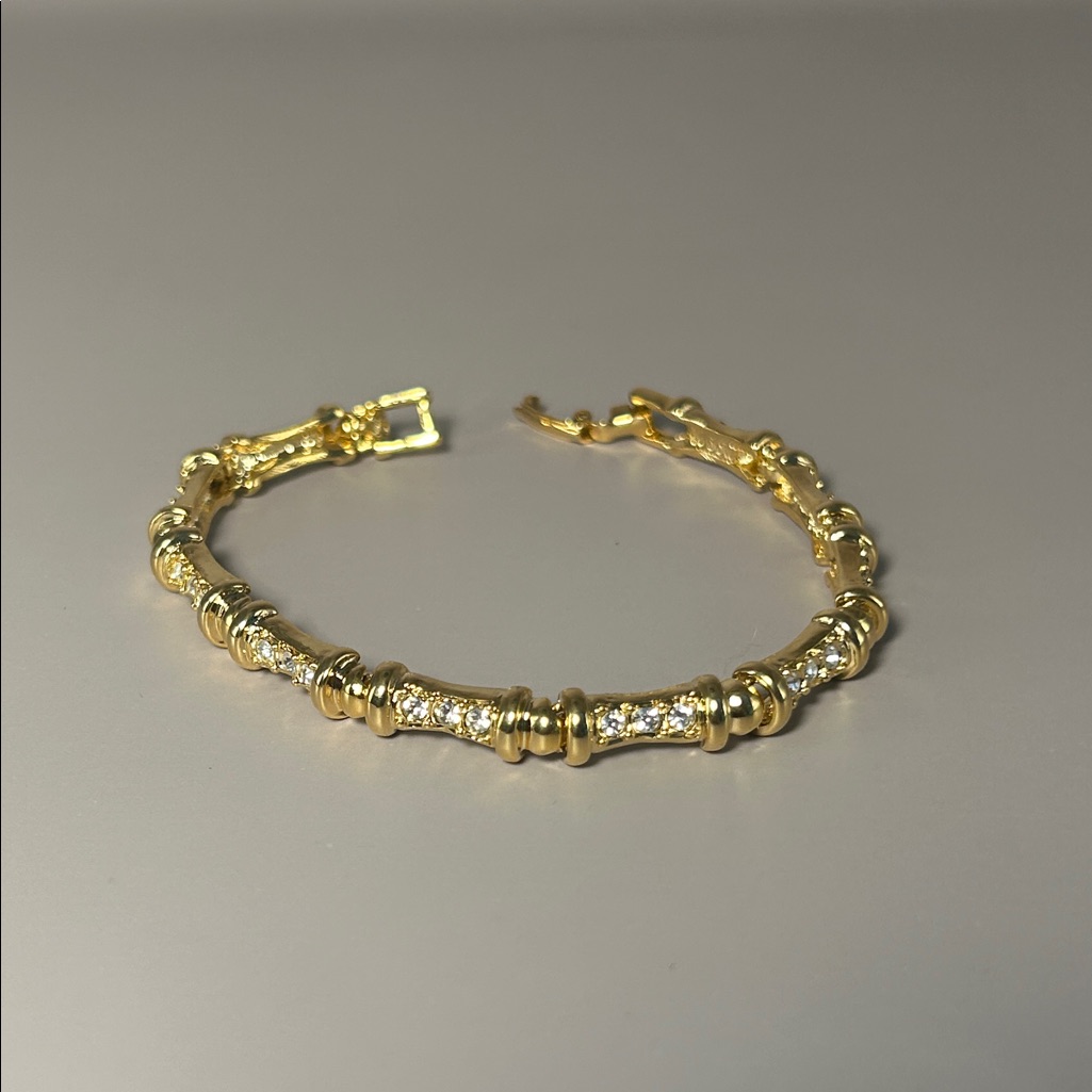 Costume Jewelry Classic Gold Tennis Bracelet With Cz Accents